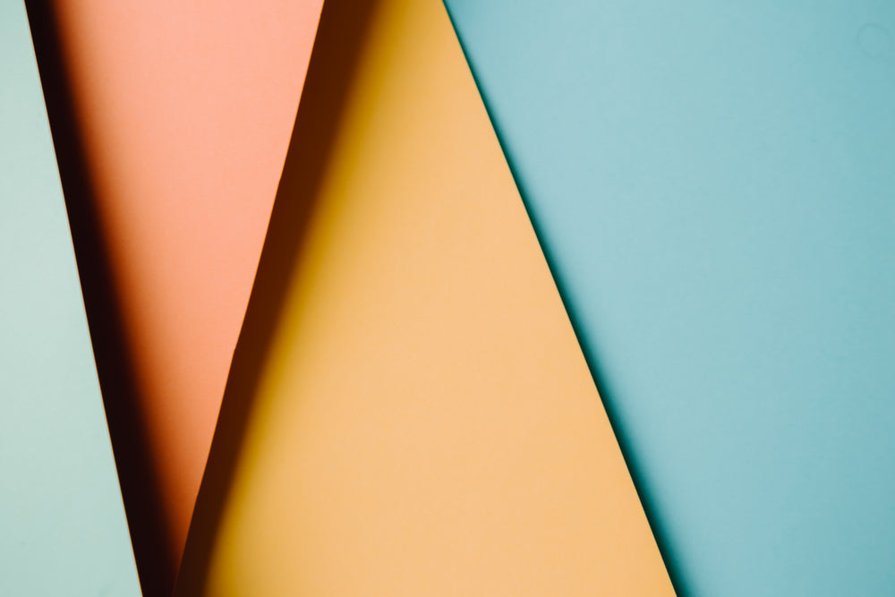 abstract background of four colored triangles