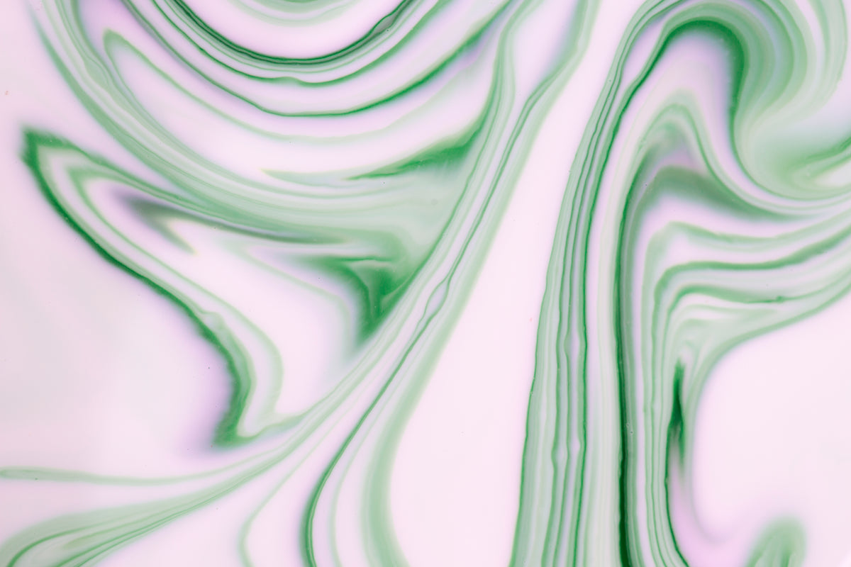 abstract image of lime green and pink marbling
