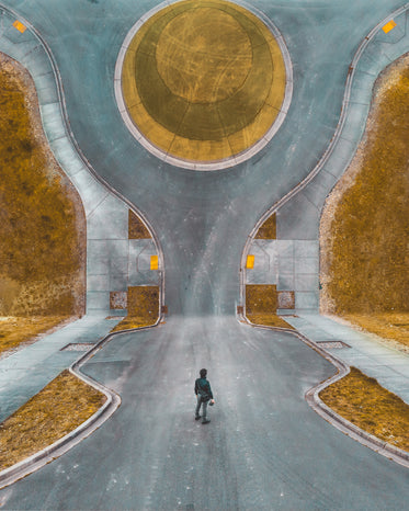 abstract image of man standing in road