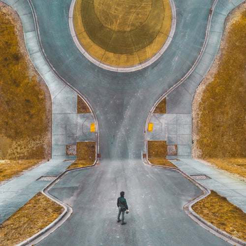 Abstract Image Of Man Standing In Road