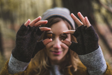 Free Stock Photo of Acorns Held In Front Of Eyes — HD Images