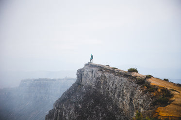 adventurer on cliff