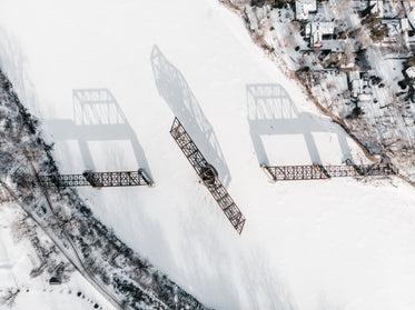 aerial view of a swing bridge frozen in time