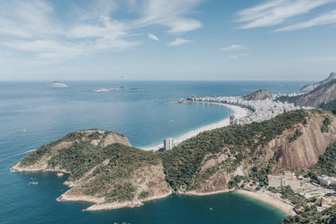 aerial view of a town on an ocean coastline