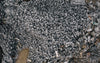 aerial view of mountains of crushed metal cubes