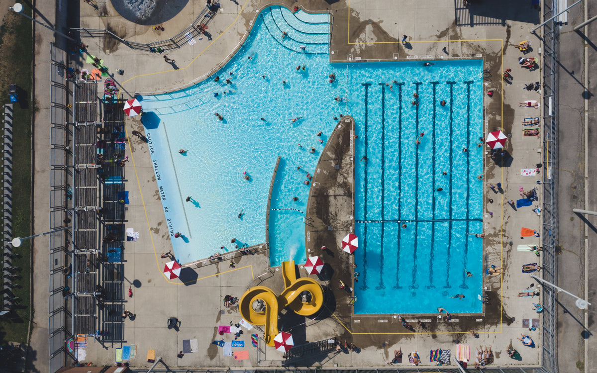 aerial view of swimming pool and waterslides from drone