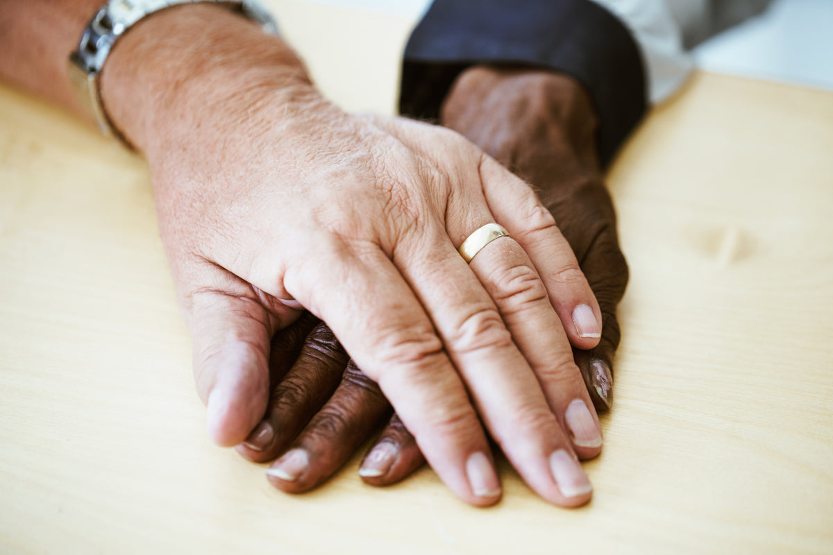 aged couple hands