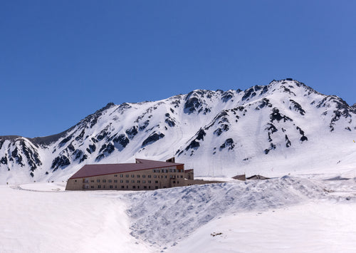 alpine hotel on snowy mountainside