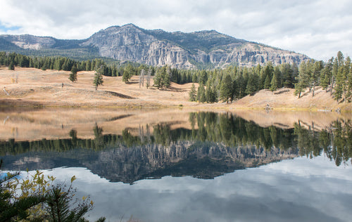 alpine lake becomes a natural mirror