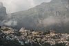 amalfi coast town with mountains behind