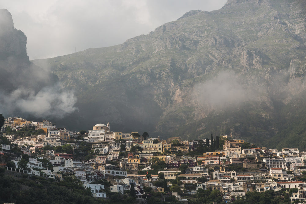 amalfi coast town with mountains behind