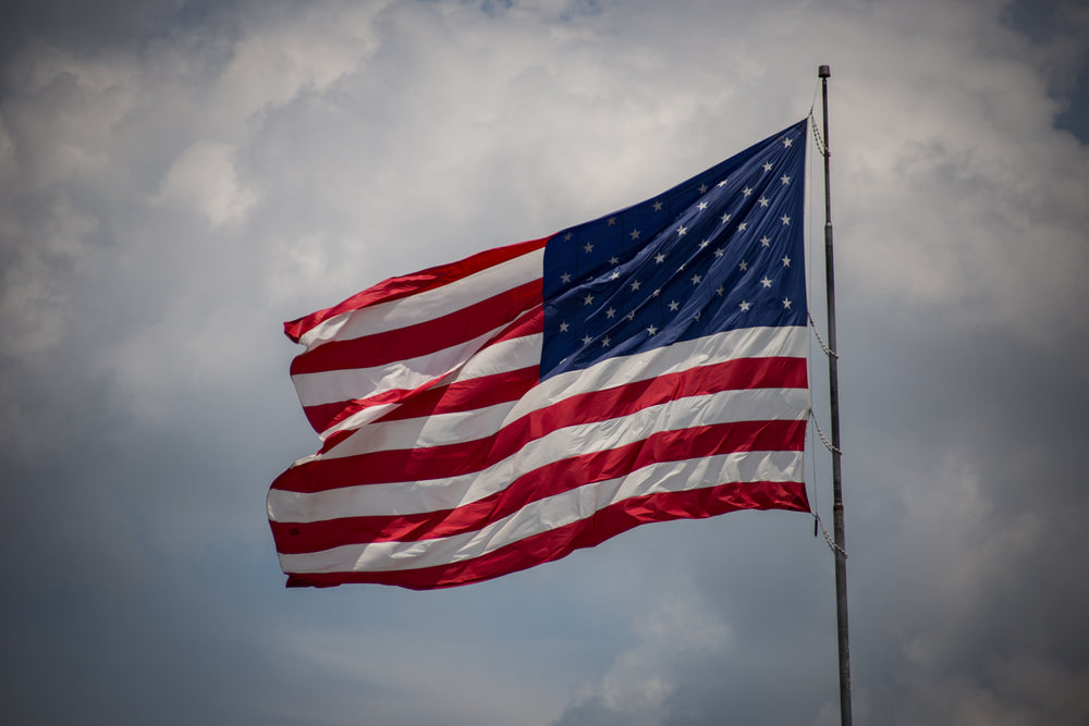 american flag flying in the wind