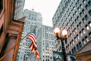 american flag near lamp post