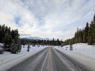 an empty road on a winter day