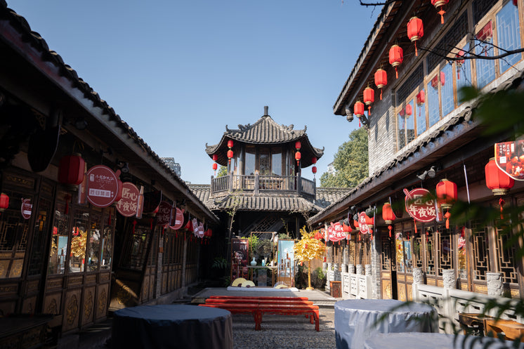 an open courtyard with red lanterns at each doorway - Detox Teas: Can they be Helpful For Detoxification?