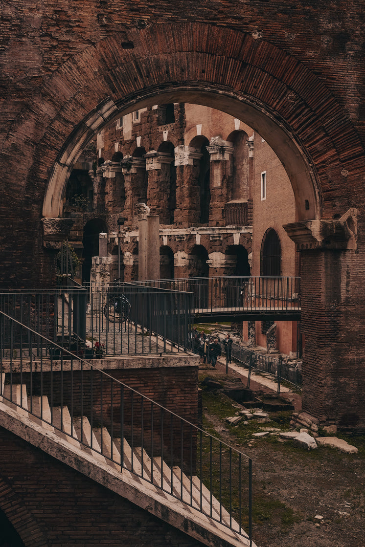 Ancient Stone Building Viewed Through An Archway