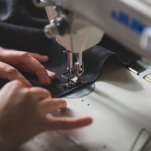 Angled View Of Sewing Machine Use