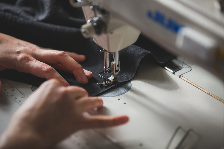 Angled View Of Sewing Machine Use