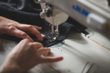 Free Stock Photo of Angled View Of Sewing Machine Use — HD Images