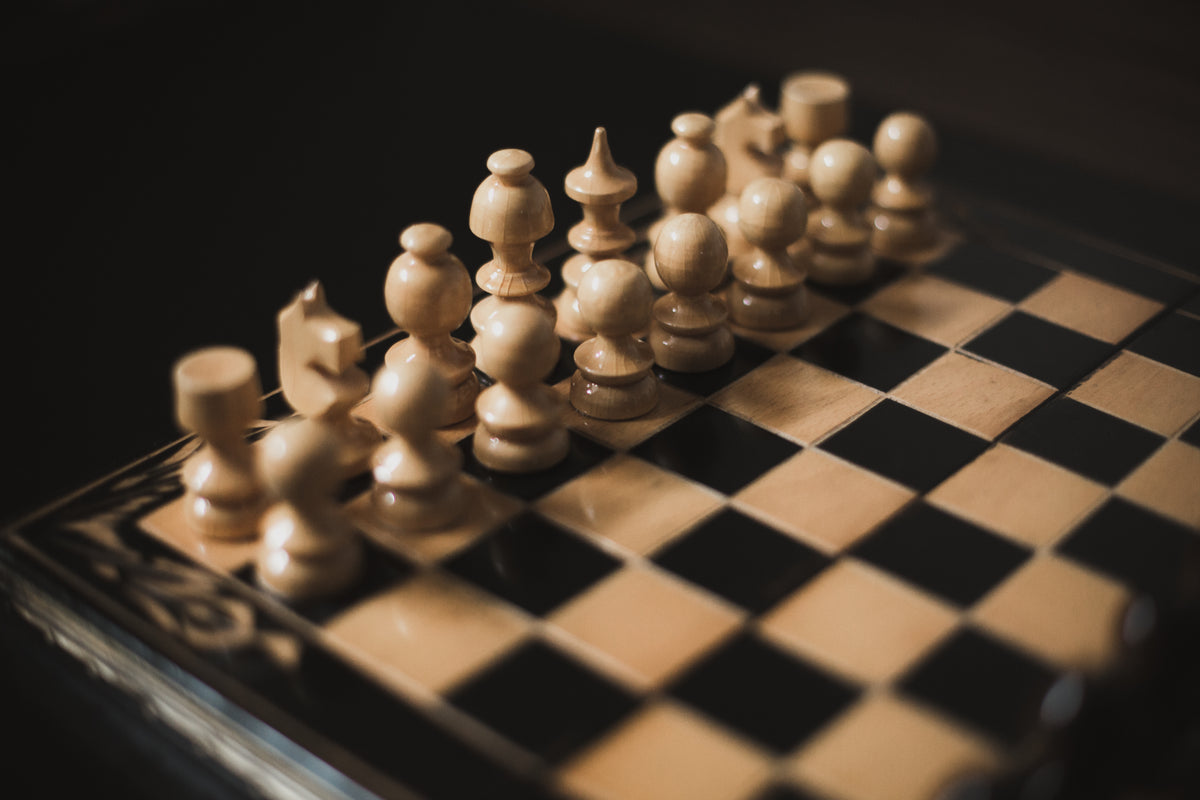 Browse Free HD Images of Wooden Chess Set In Partial Window Light