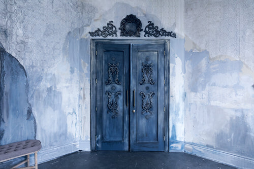 antique doors in aging mansion