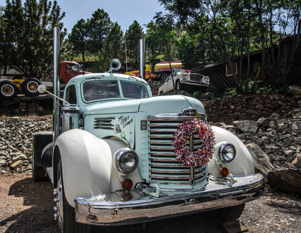 antique trucks and cars on display