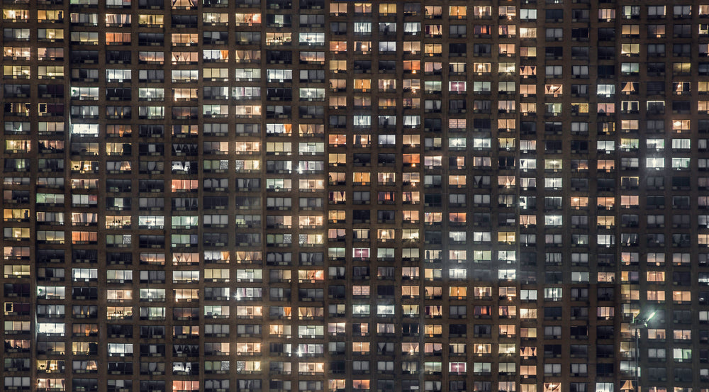 apartment building windows glowing