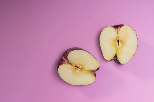 apple slices on a purple background