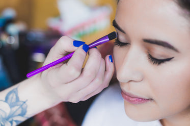 applying eyeshadow