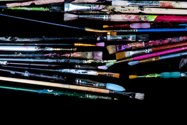artists colorful paint brush collection laid out