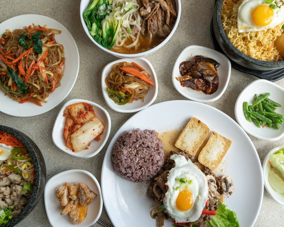 assorted korean foods in restaurant