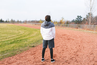 athlete standing on running track