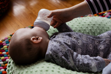 baby feeding on beanbag