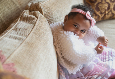 baby smiling at camera