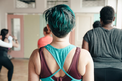 back of a woman in yoga