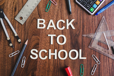 back to school flatlay on wood