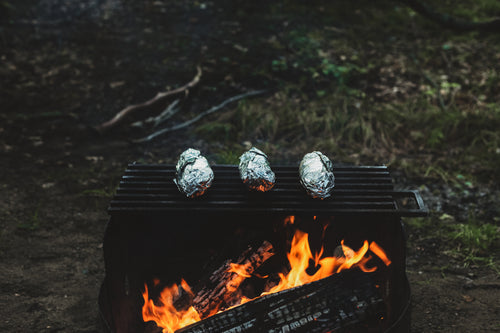 baked potatoes on campfire