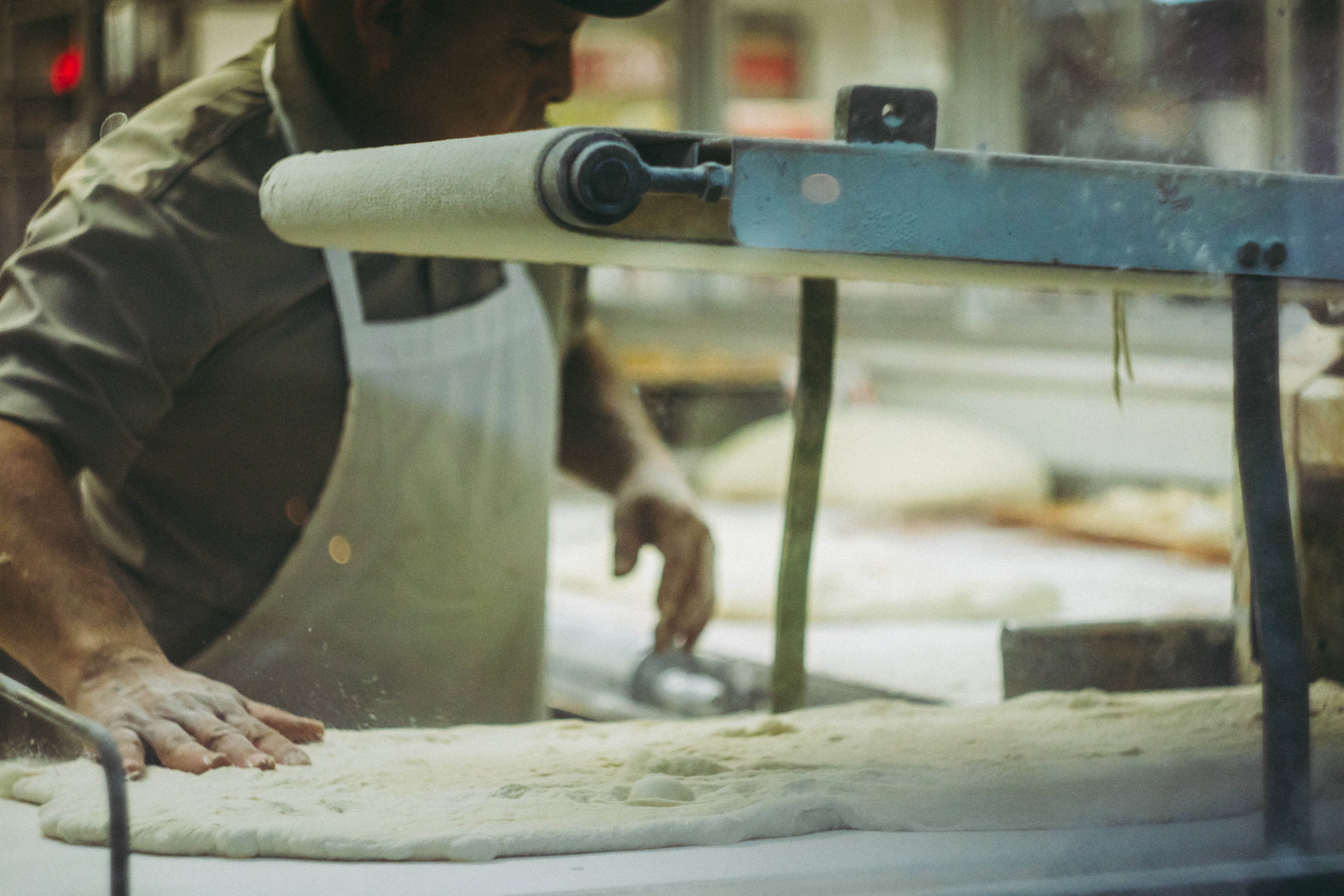 Baker Kneading Out Dough