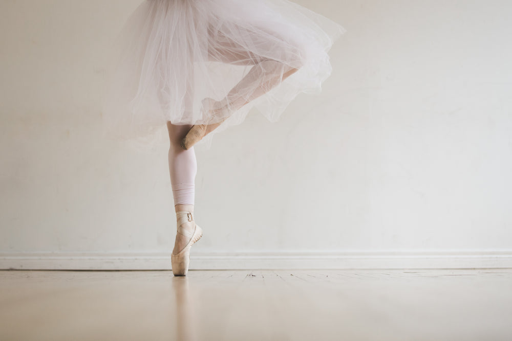 ballet dancer in tutu on toes
