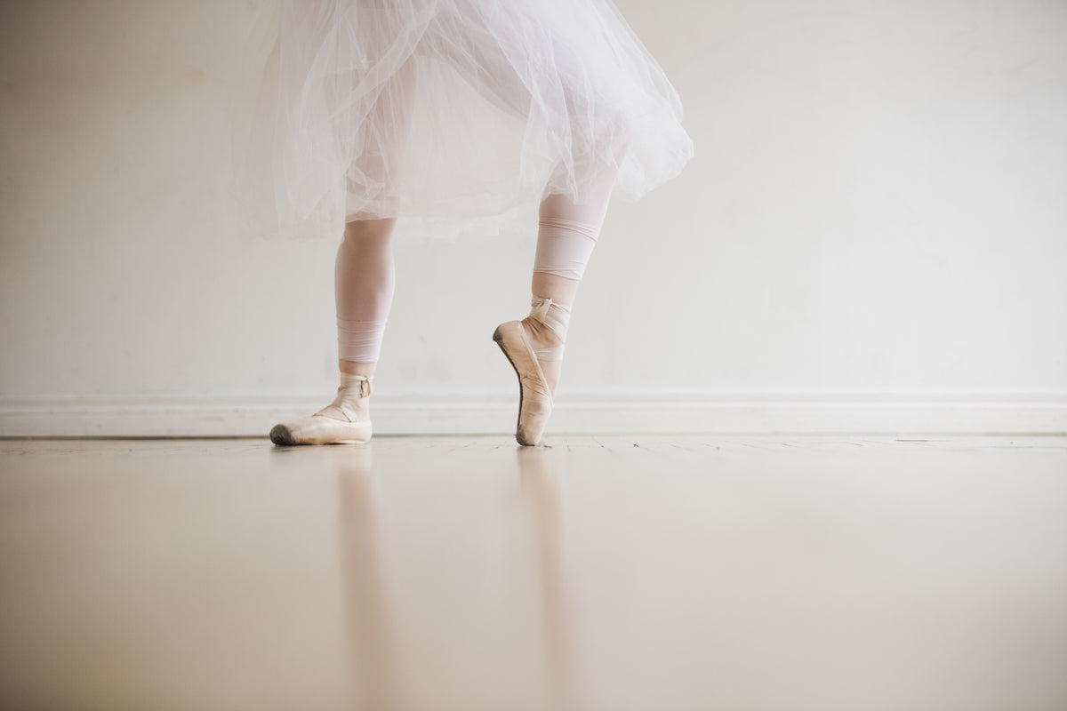 ballet dancer stretches feet