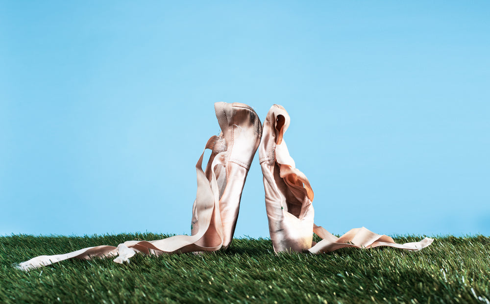 ballet pointe shoes on grass