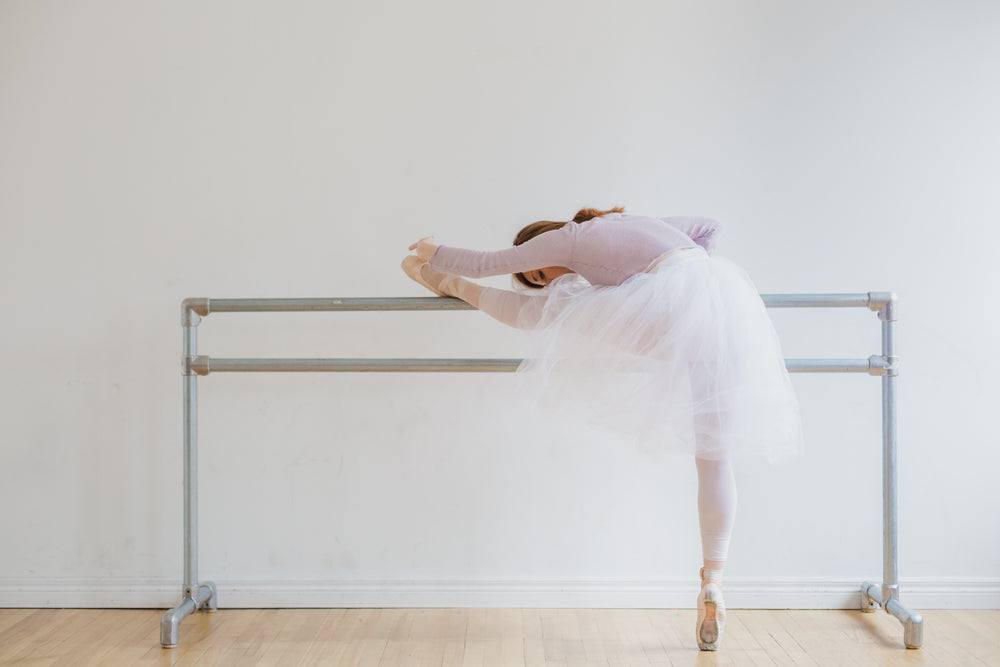 bar in dance studio warm up