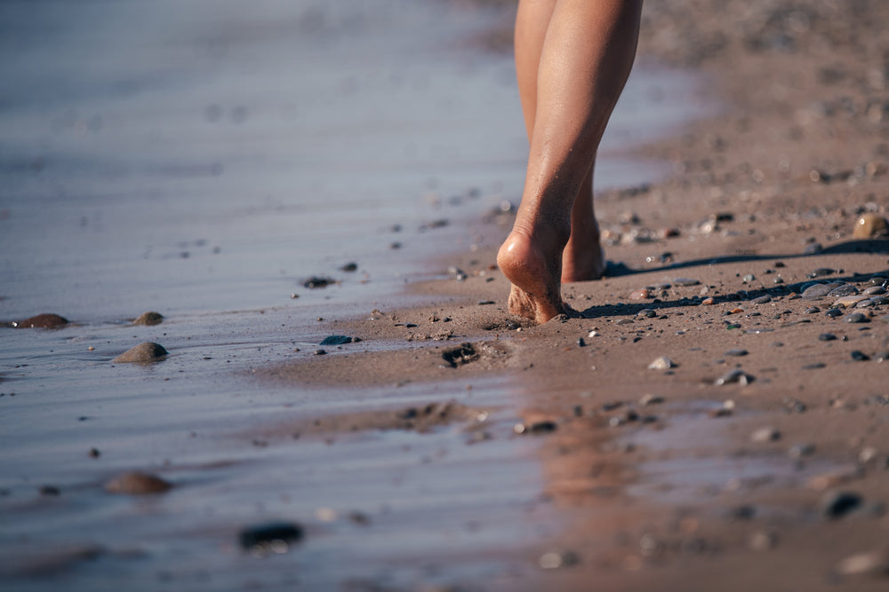 barefoot in the sand