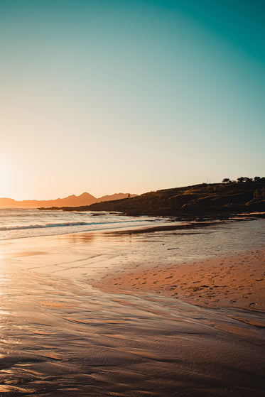 beach at sunset in teal and orange