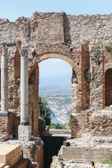 beach view framed by ruins