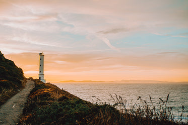 beacon nestled at the edge of a cliff