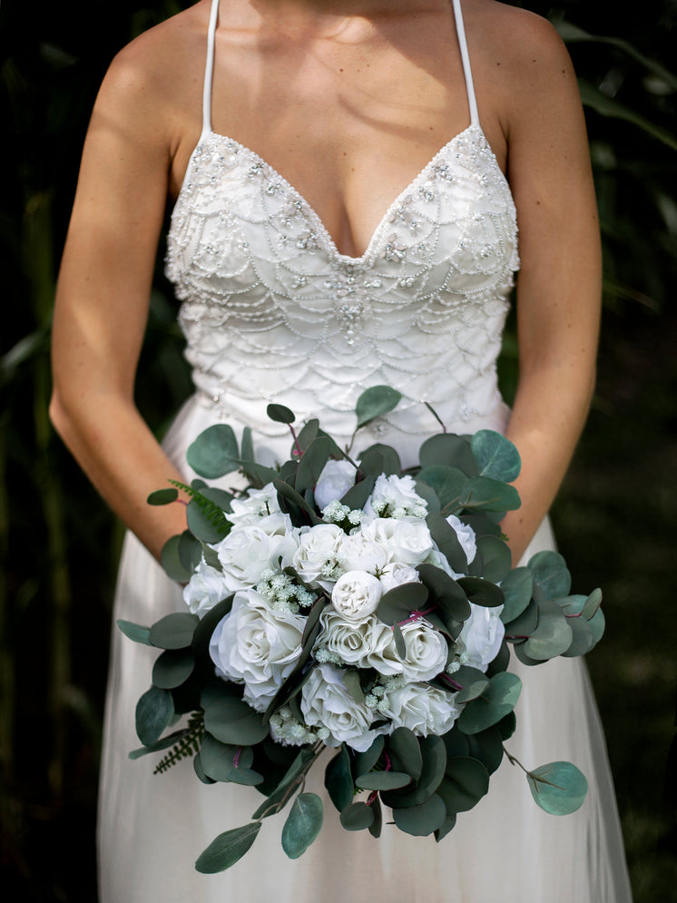 beaded-wedding-dress-with-white-bouquet.