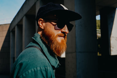 bearded man in sun and shadow