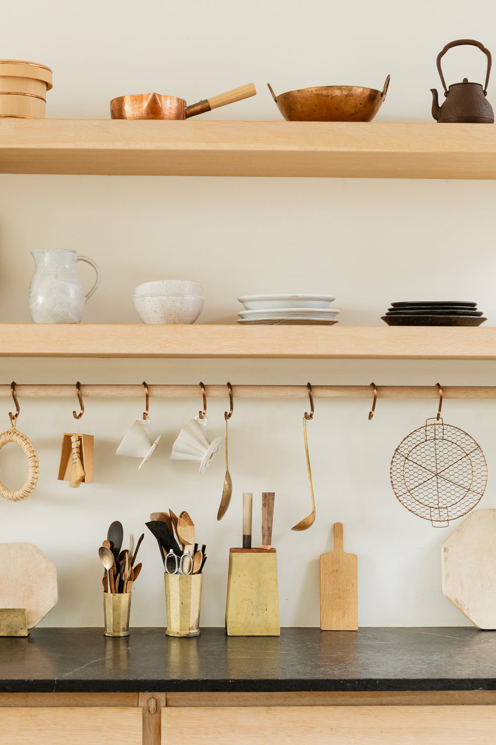 beautiful kitchen utensils in bright wooden kitchen