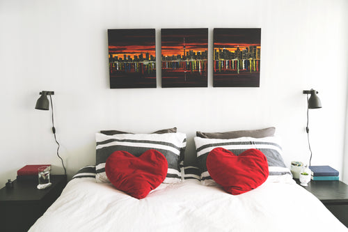 bedroom with heart pillows